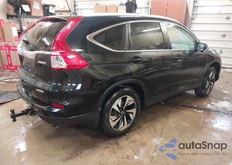 2016 Honda Cr-V Touring z USA, uszkodzony, nr VIN 5J6RM4H98GL021624